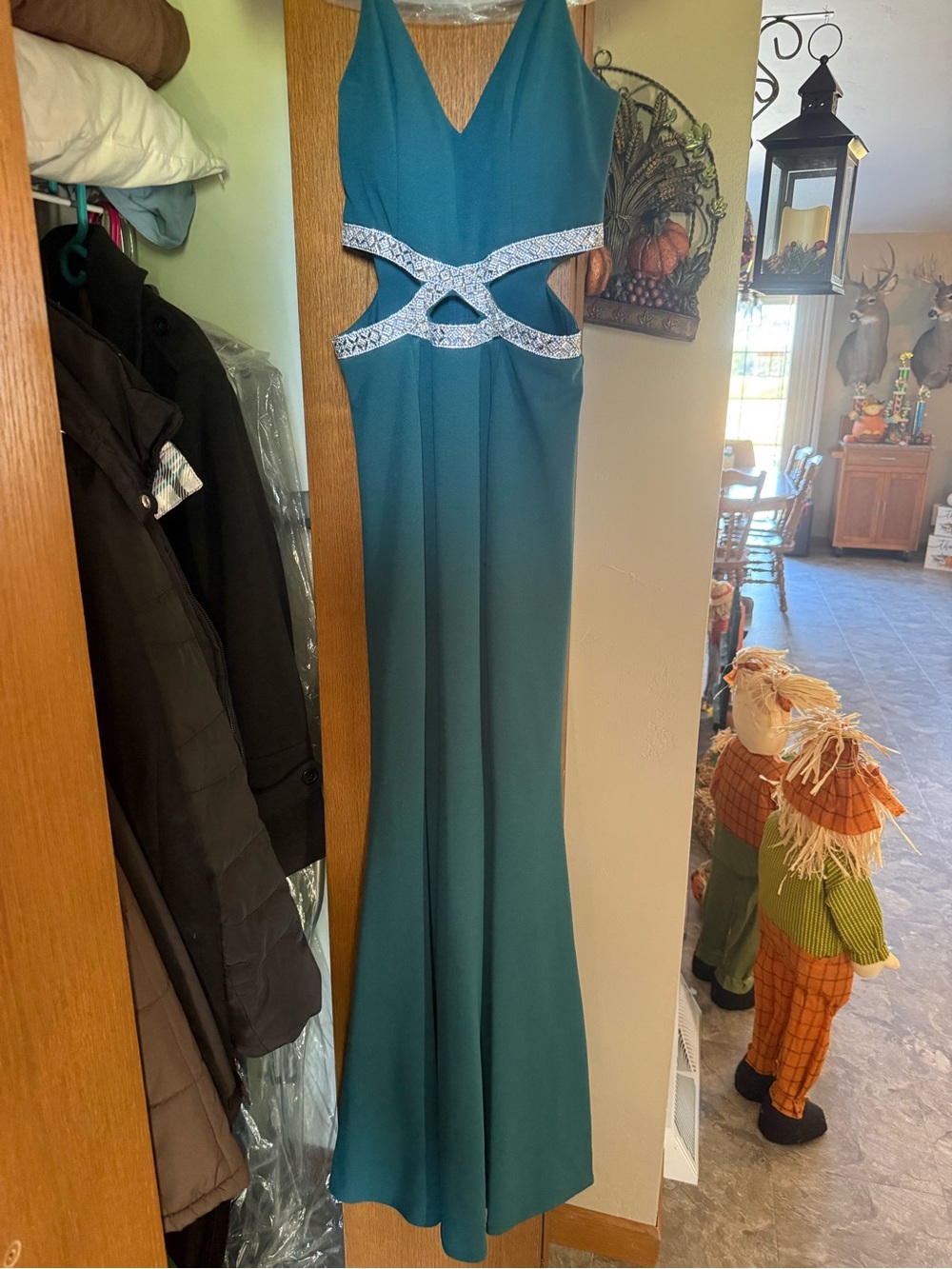 Elegant Teal Evening Gown with Embellished Cutouts